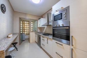 Η κουζίνα ή μικρή κουζίνα στο Elegant Apartment in Prestigia Golf Marrakech