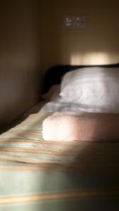 Postel nebo postele na pokoji v ubytování Hotel Vita