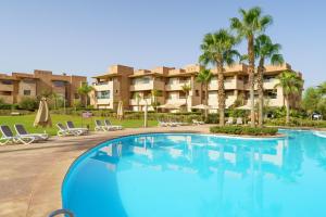 Πισίνα στο ή κοντά στο Elegant Apartment in Prestigia Golf Marrakech