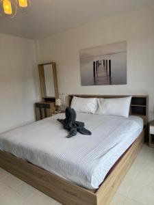 Postel nebo postele na pokoji v ubytování Apartments Kata Beach