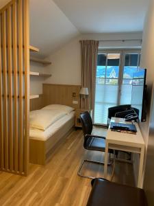 Voodi või voodid majutusasutuse Hotel Friesacher toas