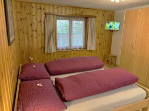 Postel nebo postele na pokoji v ubytování Chalet Medi