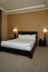 Postel nebo postele na pokoji v ubytování Dilijan Park Resort & Villas