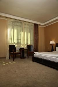 Postel nebo postele na pokoji v ubytování Dilijan Park Resort & Villas