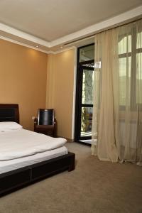 Postel nebo postele na pokoji v ubytování Dilijan Park Resort & Villas