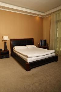 Postel nebo postele na pokoji v ubytování Dilijan Park Resort & Villas