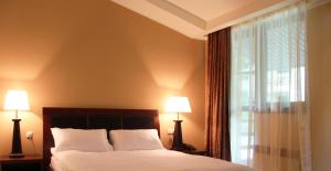 Postel nebo postele na pokoji v ubytování Dilijan Park Resort & Villas
