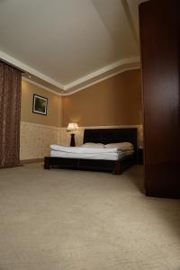 Postel nebo postele na pokoji v ubytování Dilijan Park Resort & Villas