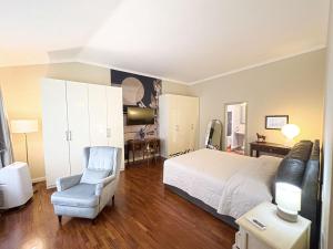 A bed or beds in a room at Domus Fontis Pescaia