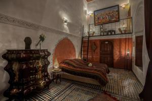 Postel nebo postele na pokoji v ubytování Riad Almaz