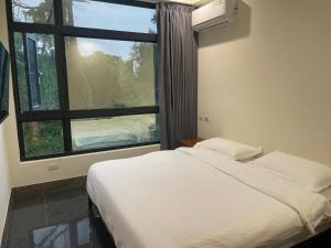 Voodi või voodid majutusasutuse 金門民宿 獺上小島民宿 文旅 青旅 toas