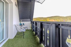 Balkón alebo terasa v ubytovaní Panorámaház Bükkszék