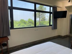 Voodi või voodid majutusasutuse 金門民宿 獺上小島民宿 文旅 青旅 toas