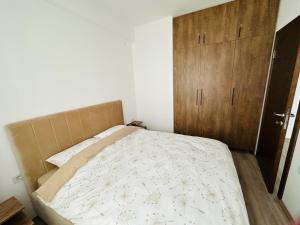 Postel nebo postele na pokoji v ubytování Aqua apartman 45-2 + 4 fotografie