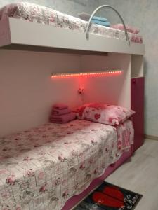 Postel nebo postele na pokoji v ubytování Appartamenti Centro Seriate + 36 fotografií