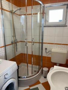 Koupelna v ubytování Minihaus in Zagreb + 21 fotografií