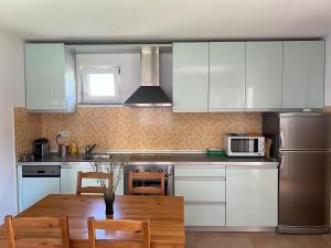 Kuchyň nebo kuchyňský kout v ubytování Minihaus in Zagreb