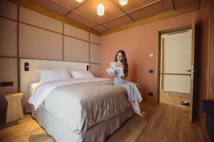 Voodi või voodid majutusasutuse Aparthotel Craiova toas