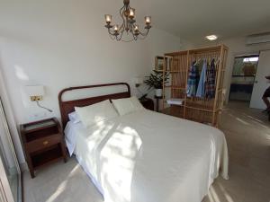 Ένα ή περισσότερα κρεβάτια σε δωμάτιο στο Habitaciones en CASA MIGUEL