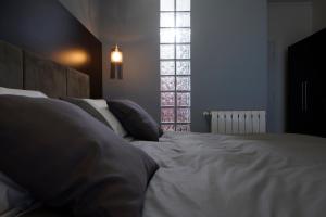 Кровать или кровати в номере Venere B&B