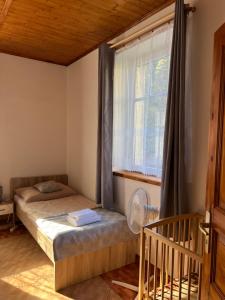 Postel nebo postele na pokoji v ubytování Hřensko 27 Apartmány