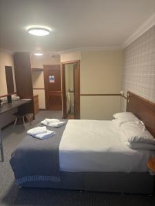 Postel nebo postele na pokoji v ubytování Findlay's