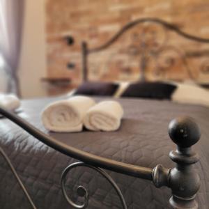 a bed with two pillows on top of it at Lovely Escape in Venice in Mestre