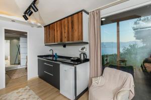 Kuchyň nebo kuchyňský kout v ubytování Super Exclusive Bungalow Vacation
