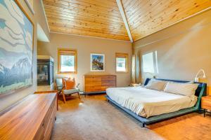a bedroom with a bed and a wooden ceiling at Mtn-View Frisco Home Near Skiing and Hiking! in Frisco