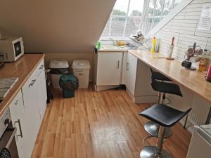 a small kitchen with a counter and a sink at 114 Coltman Street Hull in Hull