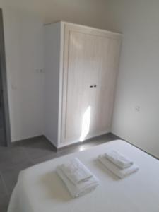 Postel nebo postele na pokoji v ubytování LA ERA 30