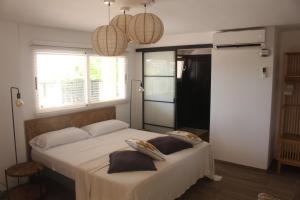 Postel nebo postele na pokoji v ubytování Casa la Siësta Albir