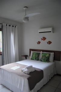 Ένα ή περισσότερα κρεβάτια σε δωμάτιο στο Bahia Bonita Flat