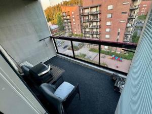 Χώρος καθιστικού στο Saunallinen & rauhallinen asunto