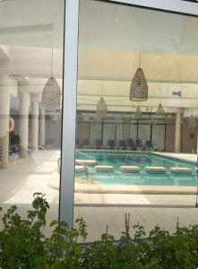 Bazén v ubytování Luxueux appart-hotel nebo v jeho okolí