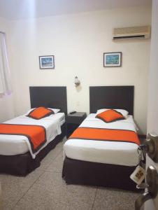 Postel nebo postele na pokoji v ubytování Hotel Jafer
