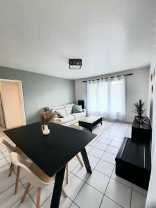 Posezení v ubytování Joli appartement Proche Orléans