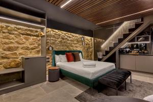 Ένα ή περισσότερα κρεβάτια σε δωμάτιο στο LUXURY EVOLUTION ROOMS
