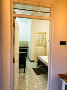 Ένα ή περισσότερα κρεβάτια σε δωμάτιο στο White House Weligama