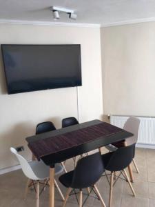 TV a/nebo společenská místnost v ubytování Departamento con vista al mar! Horcón Maitencillo + 25 fotografií