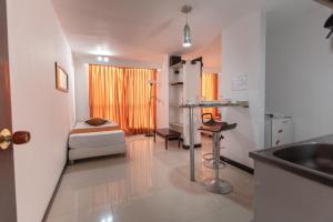 Voodi või voodid majutusasutuse Hotel Plaza Norte Cali toas