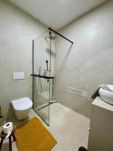 Kúpeľňa v ubytovaní VILLA TIEGO