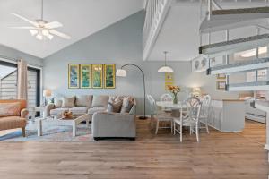 a living room with a couch and a table at Cotton Bayou Unit 4E in Orange Beach