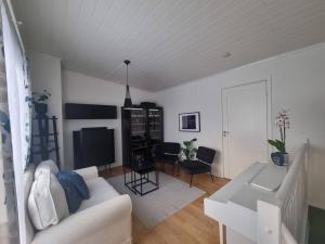 Khu vực ghế ngồi tại Koselig familiebolig Granåsen +18 ảnh