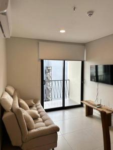 Μια τηλεόραση ή/και κέντρο ψυχαγωγίας στο Departamento Home Ycua Sati