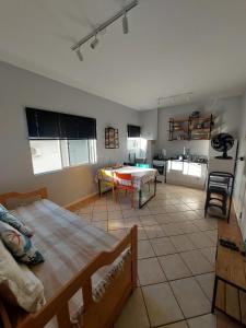 Postel nebo postele na pokoji v ubytování Excelente Apartamento a 1 quadra e meia do mar + 5 fotografií