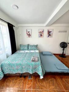 Voodi või voodid majutusasutuse Pereira Central Aparta-estudio toas