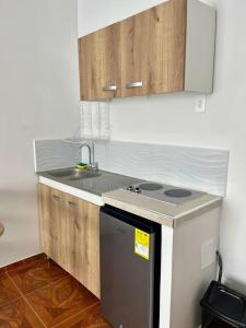 Køkken eller tekøkken på Central Aparta-estudio Pereira