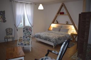 Postel nebo postele na pokoji v ubytování Appart hôtel 14 st Anne