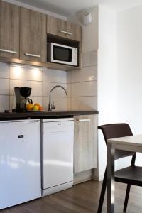Kuchyň nebo kuchyňský kout v ubytování Résidence Signal Du Prorel - Studio avec coin montagne · Au pied des pistes · Wifi gratuit MAE-0974 + 7 fotografií